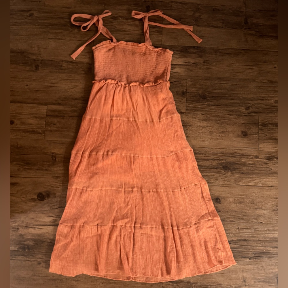New In Boutique Halter Ruffle Dress. Size M. Rust, comfy, lined.
